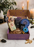 spiritual subscription box with tarot cards, protection rituals, tiger's eye crystal, and witchcraft tools for divine protection