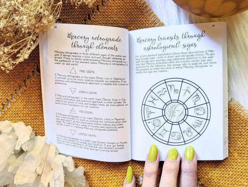 Mercury in Retrograde guided journal featuring celestial illustrations and reflective writing prompts.