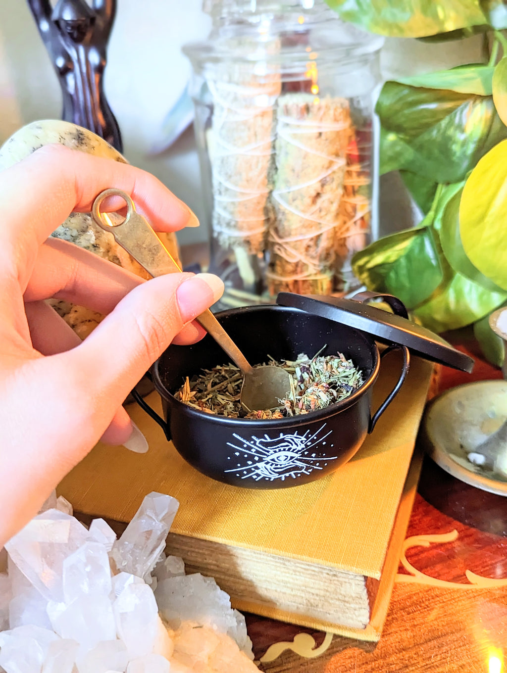 Mystic Cauldron with Jasper and chamomile in cauldron