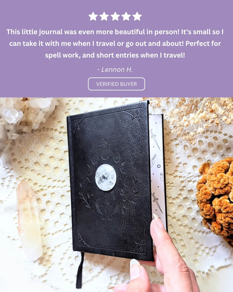 Black leather journal held by a hand with a star rating and review text on a purple background