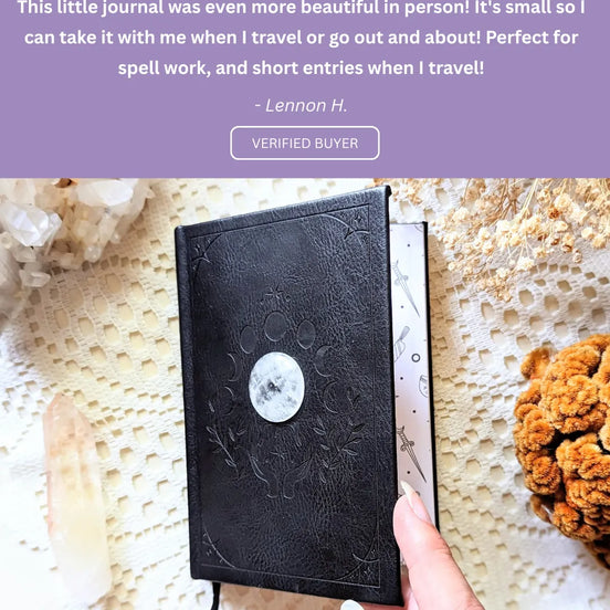 Black leather journal held by a hand with a star rating and review text on a purple background