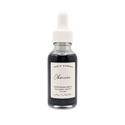 Detoxify and rejuvenate your skin with Obscura Ampoule Serum. Infused with Black Seaweed and Bamboo Charcoal, this vegan elixir refreshes all skin types. Available at Goddess Provisions.