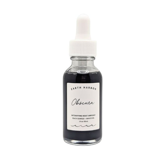 Detoxify and rejuvenate your skin with Obscura Ampoule Serum. Infused with Black Seaweed and Bamboo Charcoal, this vegan elixir refreshes all skin types. Available at Goddess Provisions.