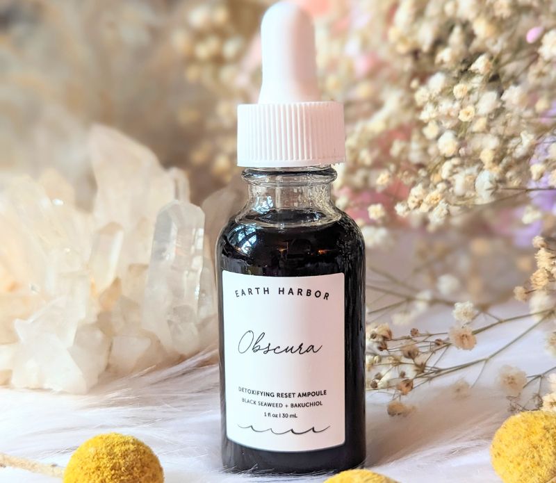 Detoxify and rejuvenate your skin with Obscura Ampoule Serum. Infused with Black Seaweed and Bamboo Charcoal, this vegan elixir refreshes all skin types. Available at Goddess Provisions.