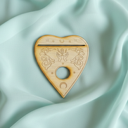 Heart-shaped planchette that doubles as an oracle card holder and crystal sphere stand.