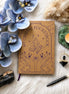 crystal journal and notebook for recording crystal meanings, healing properties, and chakra correspondences