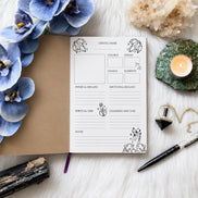 guided crystal journal with pages for crystal healing, zodiac signs, cleansing methods, and personal notes
