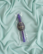 Ritual candle crafted to enhance intuition and psychic abilities when burned.