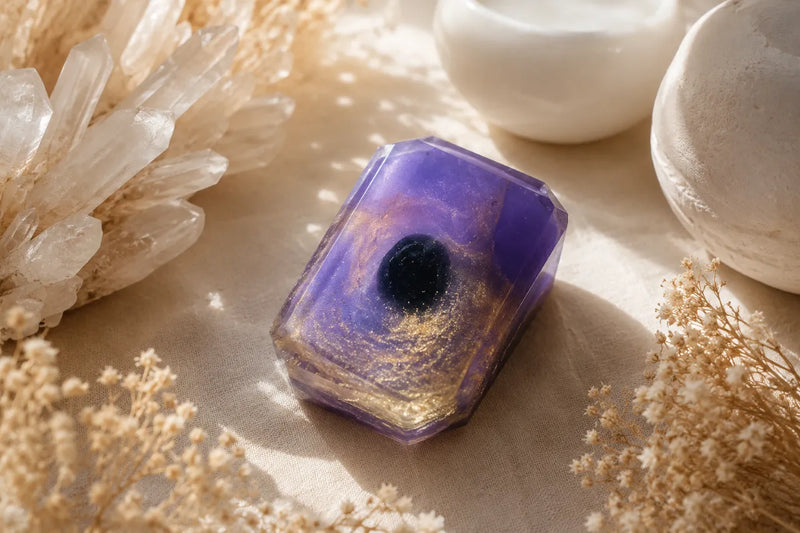 Vegan cleansing soap featuring a hidden black obsidian crystal and herbal essential oil blend.
