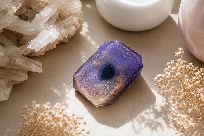 Mystical crystal-infused soap styled with lavender, rosemary, and spiritual self-care accessories.