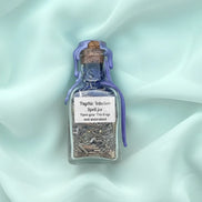 Small spell jar filled with herbs and symbolic ingredients for enhancing psychic intuition.