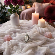 Decorative ring with symbolic design worn as a spiritual accessory.