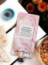 Rose quartz clay mud mask with hyaluronic acid and rose petals for hydrated glowing skin