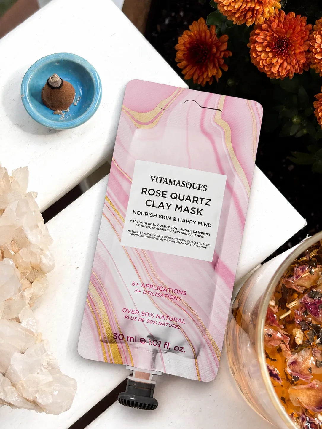 Rose quartz clay mud mask with hyaluronic acid and rose petals for hydrated glowing skin