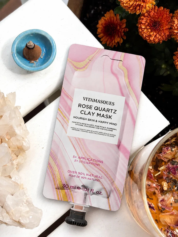 Rose quartz clay mud mask with hyaluronic acid and rose petals for hydrated glowing skin