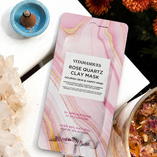 Rose quartz clay mud mask with hyaluronic acid and rose petals for hydrated glowing skin
