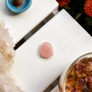 pink rose quartz healing stone used for meditation, compassion, and spiritual wellness