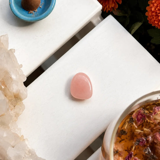 pink rose quartz healing stone used for meditation, compassion, and spiritual wellness