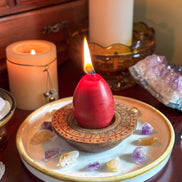 Phoenix ritual candle and incense on altar setup for shadow work and spiritual cleansing.