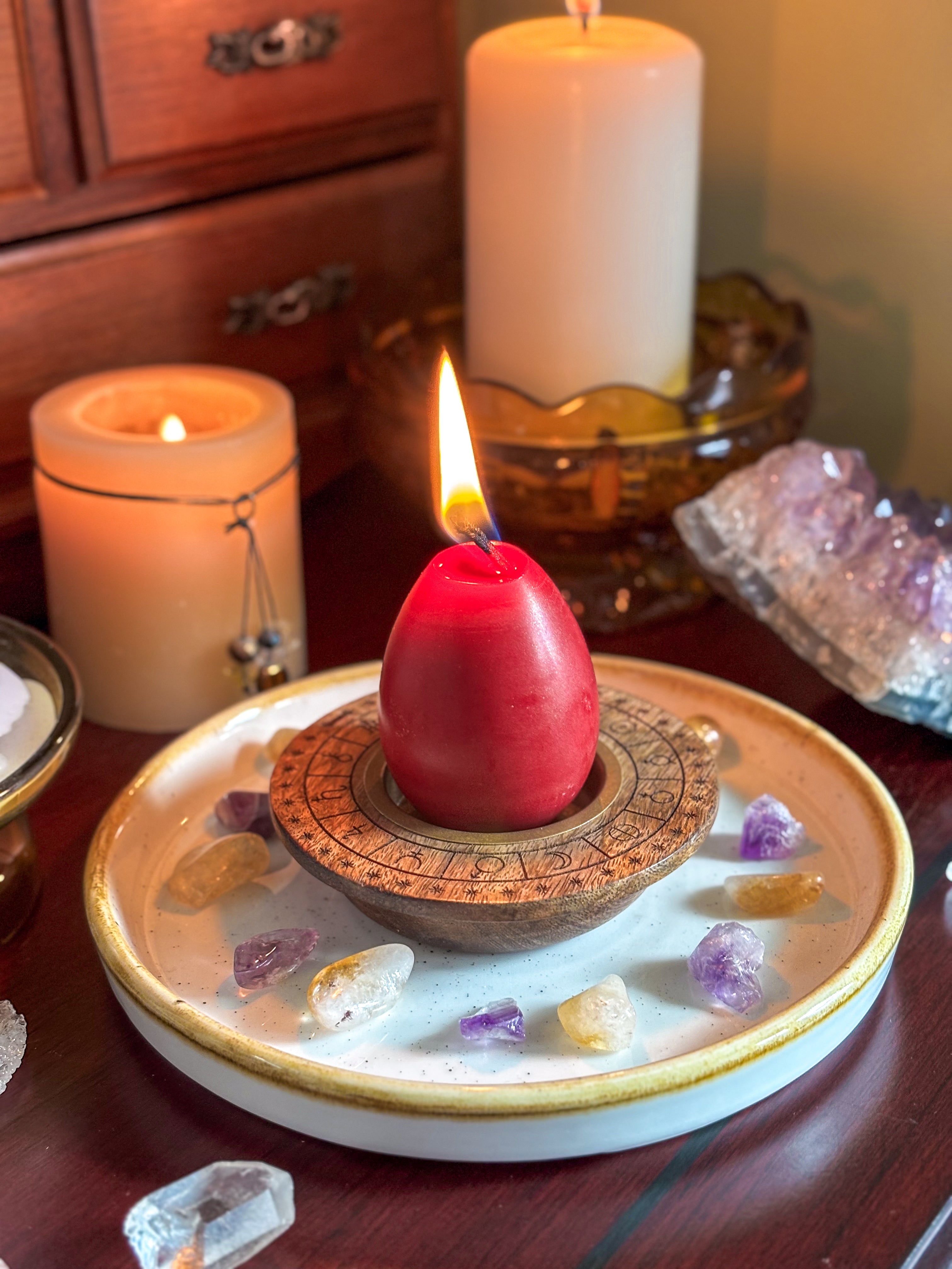 Phoenix ritual candle and incense on altar setup for shadow work and spiritual cleansing.