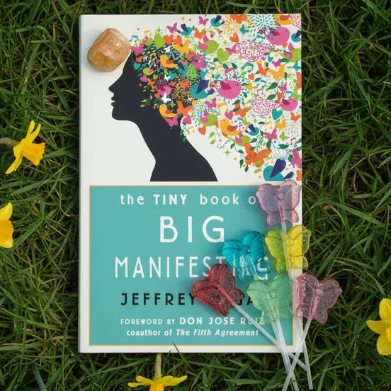 Small manifestation guidebook featuring simple techniques for intention setting and growth.