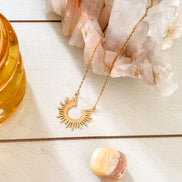 18K gold plated sun charm necklace on chain, tarnish-resistant stainless steel.