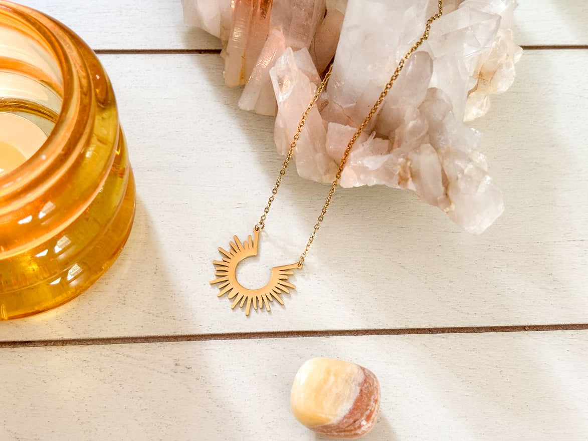 18K gold plated sun charm necklace on chain, tarnish-resistant stainless steel.