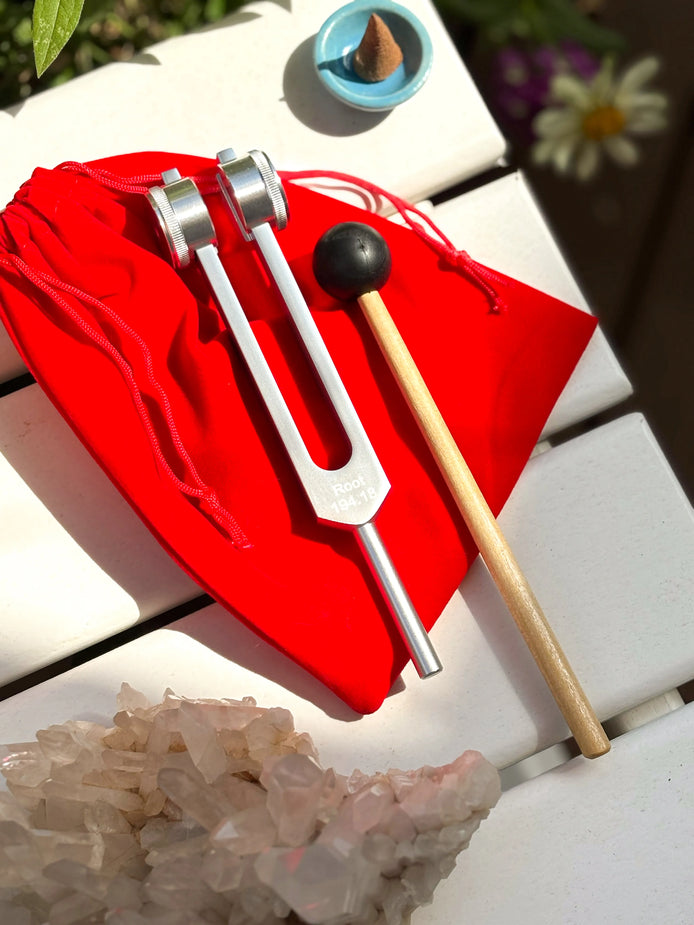 Stainless steel root chakra tuning fork engraved with I AM, designed for grounding and sound healing.
