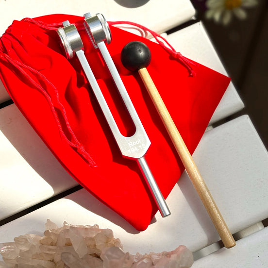 Stainless steel root chakra tuning fork engraved with I AM, designed for grounding and sound healing.