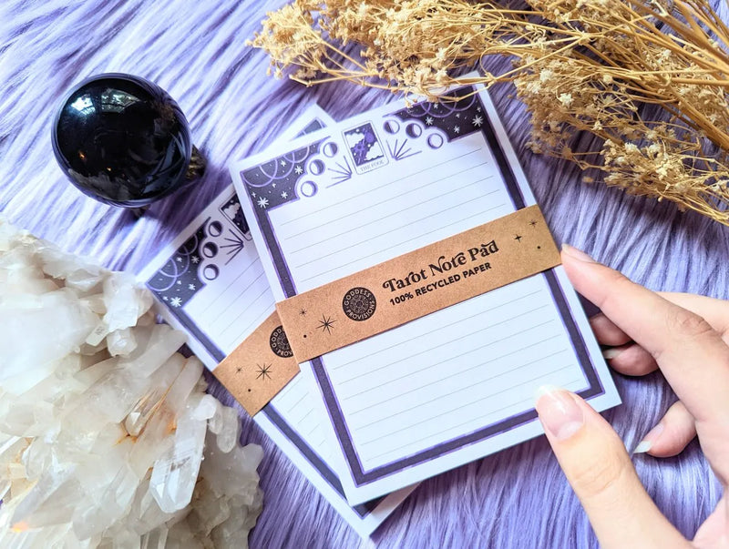Tarot-themed notepad featuring colorful Major Arcana inspired pages and lined recycled paper sheets.