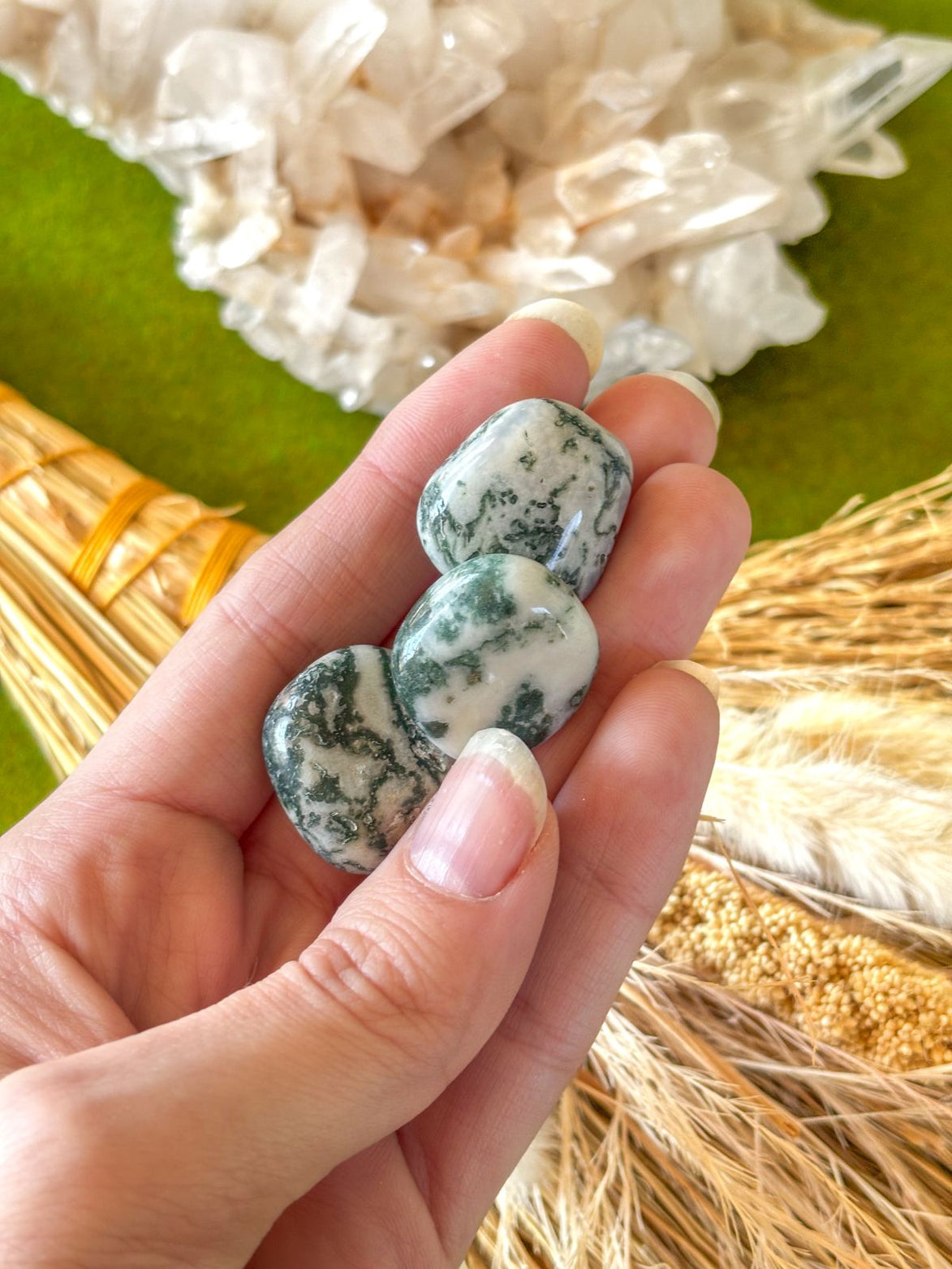 Tumbled Tree Agate crystal with natural green and white patterns for grounding energy.