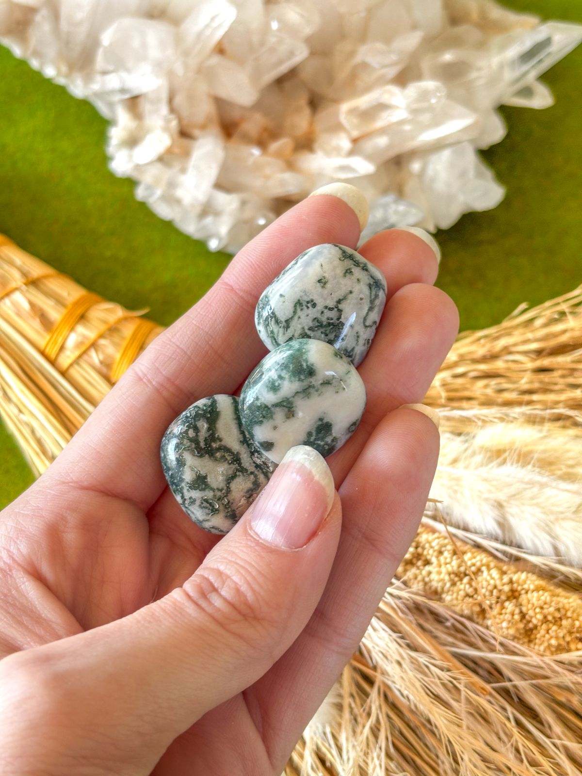 Tumbled Tree Agate crystal with natural green and white patterns for grounding energy.