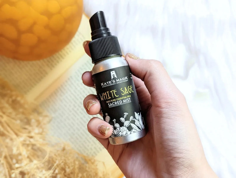 Sacred cleansing mist being sprayed in a cozy ritual space with soft natural lighting.