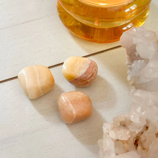 Bright yellow calcite gemstone associated with motivation and positive energy.