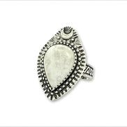 Adjustable antique silver-plated brass Clear Quartz Moonlight Ring featuring a crescent moon and crystal design. Available at Goddess Provisions