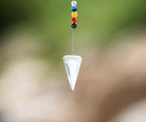 Crystal pendulum with colorful beads on a silver chain for Goddess Guide to Using a Pendulum