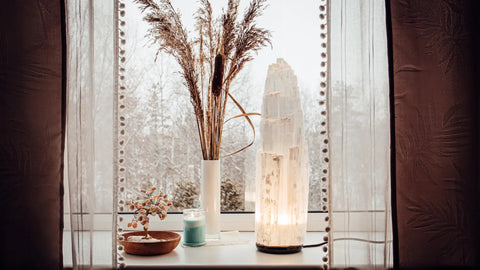 Decorative tall crystalline lamp featured in Selenite cleansing stone article