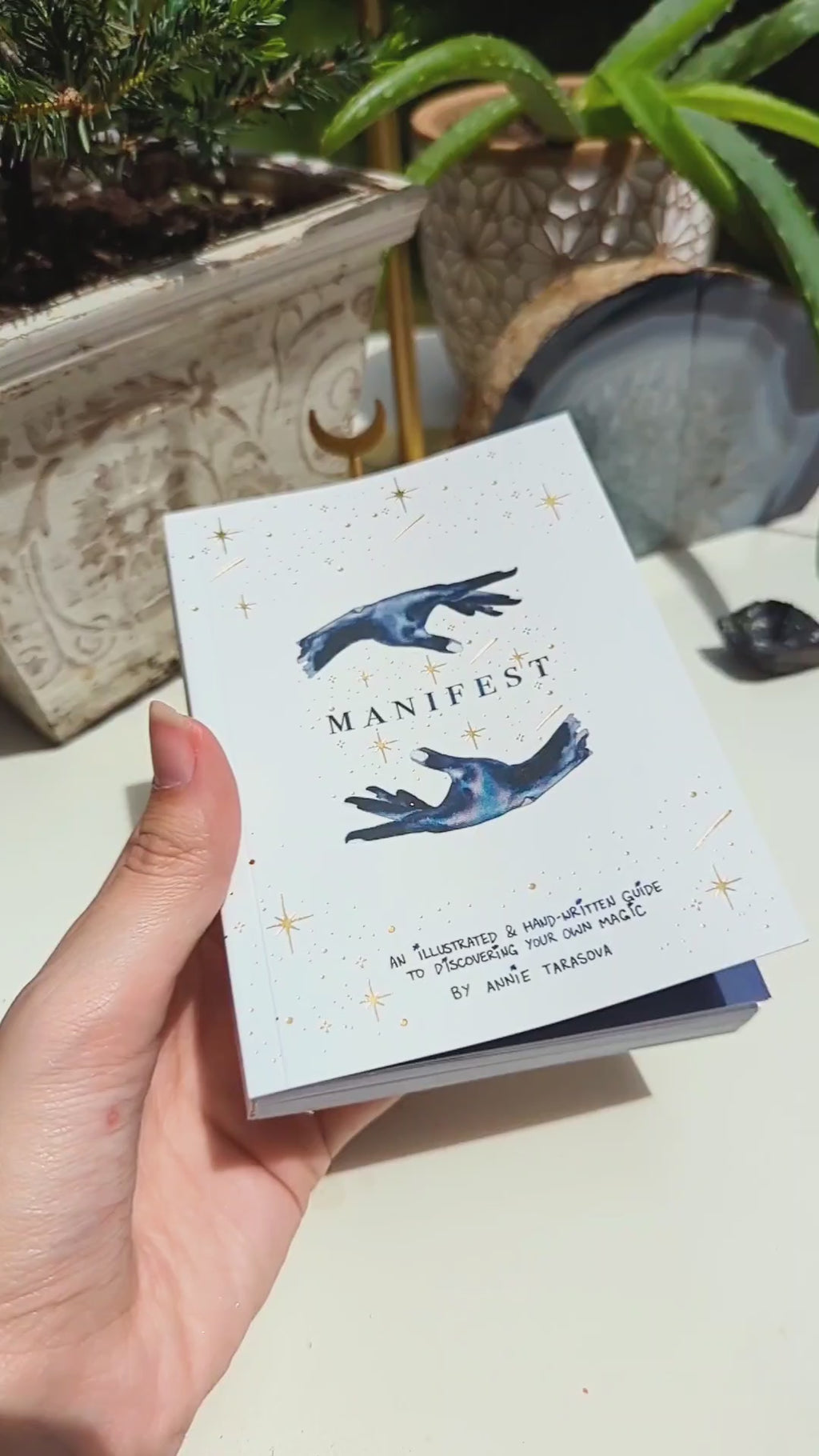 Dreamy moons manifest workbook featuring journal prompts and vision boards. Available at Goddess Provisions