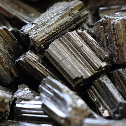 Rough black Tourmaline crystals with visible striations for balancing energy