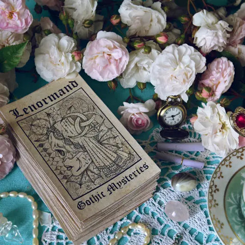 Stack of antique gothic Tarot cards with botanical illustrations for green witches