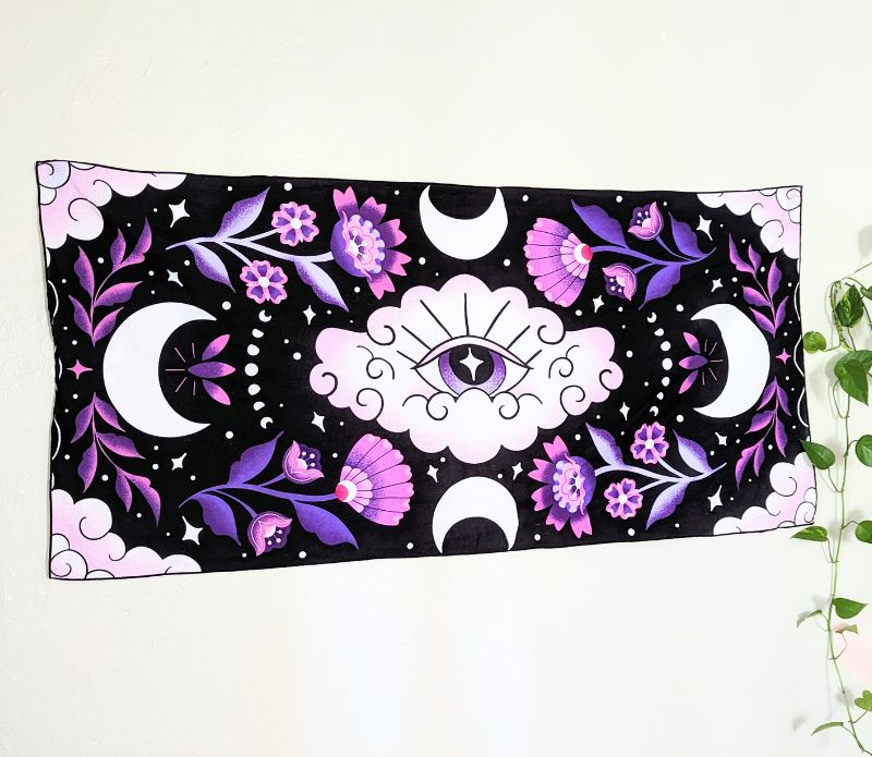 Mystic Moons Drape is used as an altar cloth for rituals. Versatile Mystic Moons textile for altars, decor, or wearing. Available at Goddess Provisions.