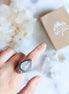 Adjustable antique silver-plated brass Clear Quartz Moonlight Ring featuring a crescent moon and crystal design. Available at Goddess Provisions