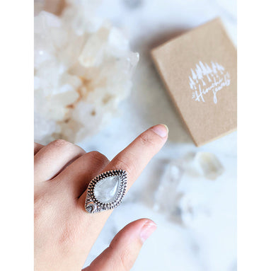 Adjustable antique silver-plated brass Clear Quartz Moonlight Ring featuring a crescent moon and crystal design. Available at Goddess Provisions