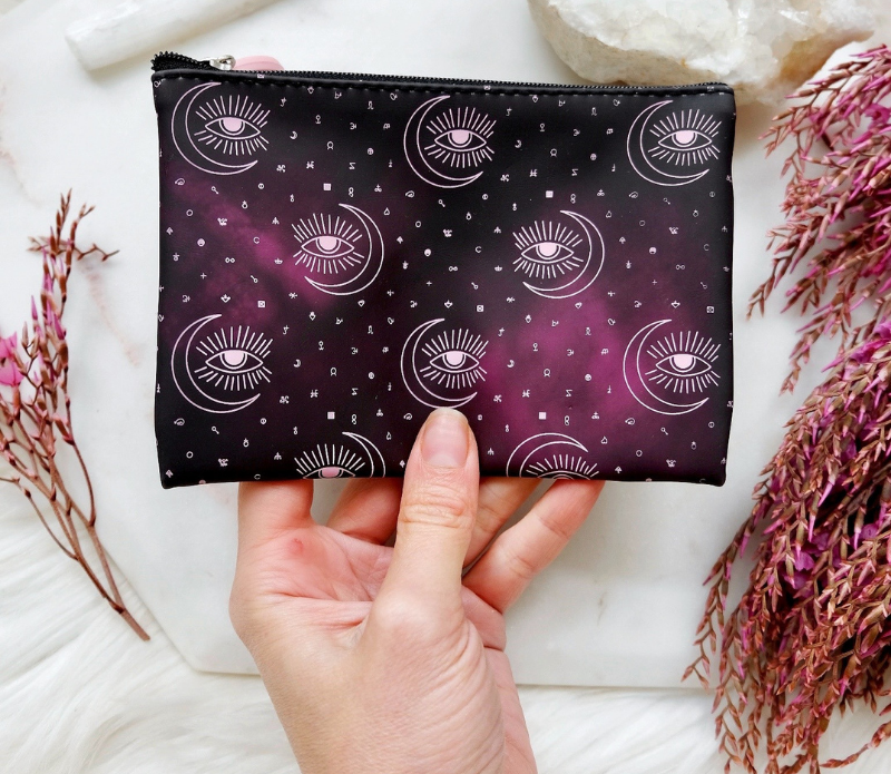 Color Changing Pouch | Color Changing Purse | Make Up Bag | Coin holder with pink tag and someone holding it | Goddess Provisions Alchemy Visions Pouch available at  Goddess Provisions