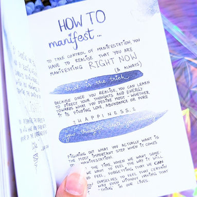 Dreamy moons manifest workbook featuring journal prompts and vision boards