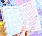 Dreamy moons manifest workbook featuring journal prompts and vision boards. Available at Goddess Provisions