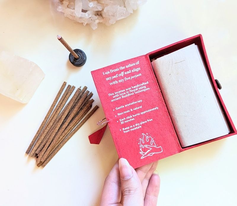 Fire of Transformation Stupa Incense Short Stick and open red box. Incense burns for approximately 30 minutes.