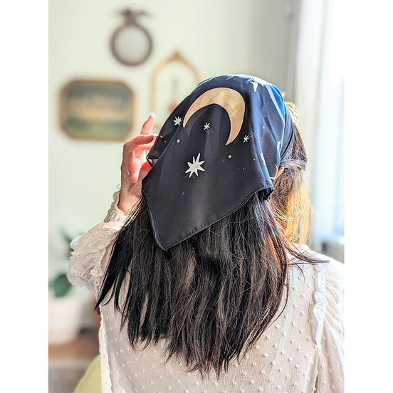 Midnight Garden vegan silk scar with stars and moon used as an altar cloth, a scarf or a headband. Available at Goddess Provisions