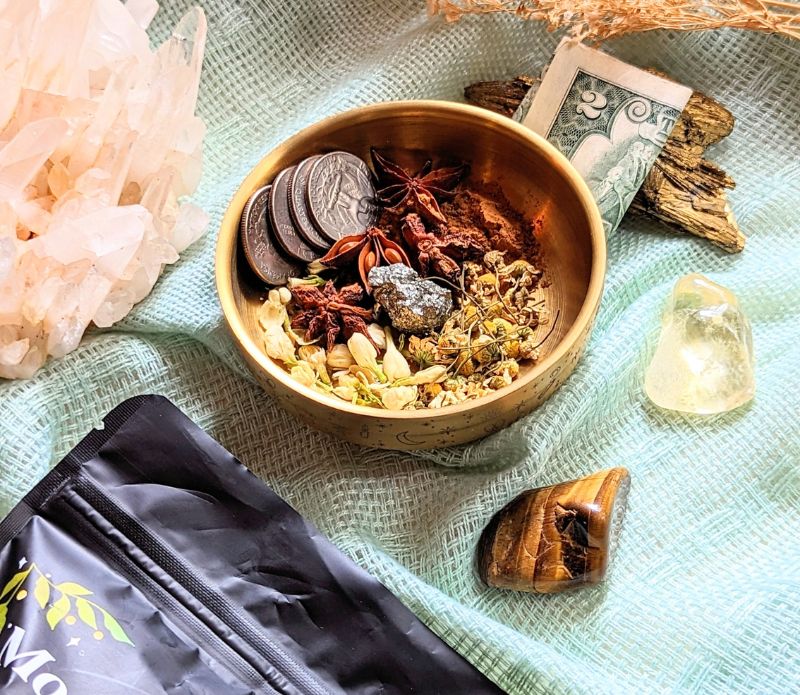 Attract abundance with the Money Magick Ritual Kit. Includes herbs, pyrite, and instructions for creating money bowls, jars, or prosperity rituals. Available at Goddess Provisions.