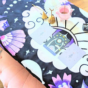 Mystic Moons Drape used as an altar cloth with for rituals. Versatile Mystic Moons textile for altars, decor, or wearing. Available at Goddess Provisions.